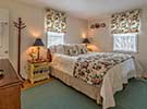 The bedroom features a King size bed with hand ironed luxury linens